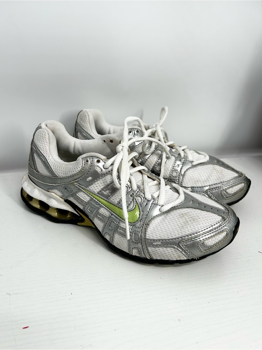 Nike size 8 Women's White & Silver Running Shoes with Lime Accent